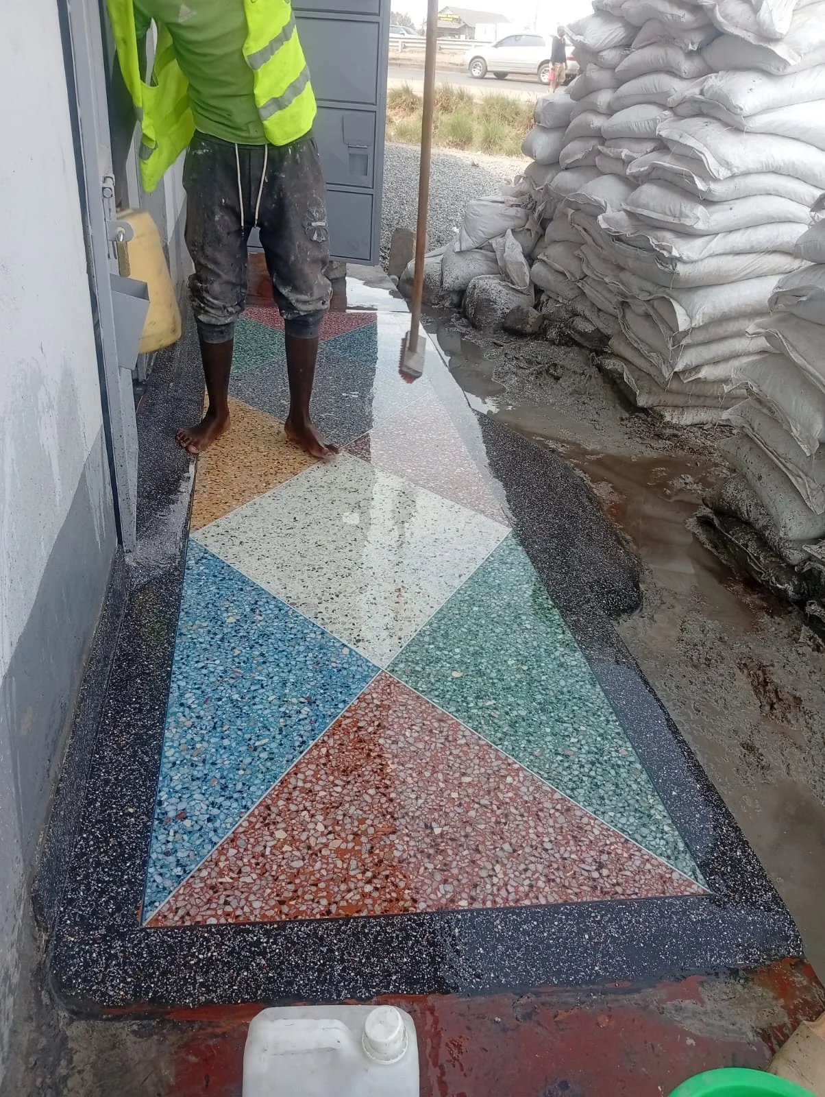 Polished terrazzo floor with marble chips in warm earth tones